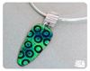Picture of Sterling silver and bright green and black torch fired enamel pendant