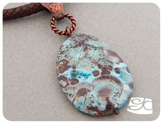 Picture of Handmade Artisan Mushroom jasper pendant with copper bail  leather cord.