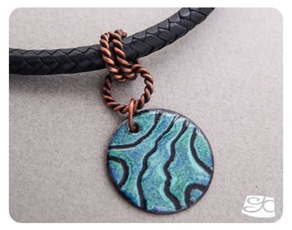 Picture of Handmade Artisan Torch fired enamel pendant in black, blues and greens.